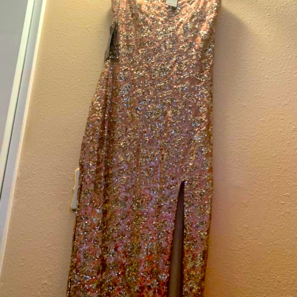Beautiful BRAND NEW BEBE gown with slit, SIZE M, tube style,great for occasions